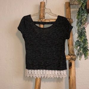Black T-shirt w/ lace & a open back.